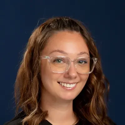 Professional headshot of Ana
